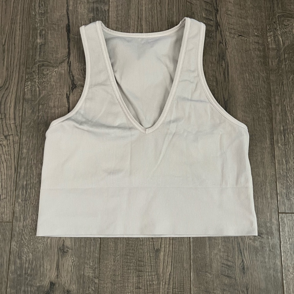 Athleta Aurora top in cream color. Size L. Like new condition.